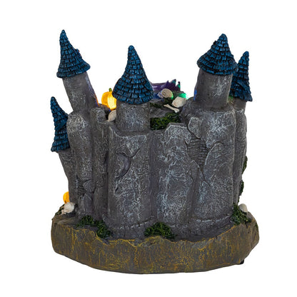 Castillo de calavera iluminado con entrada LED que cambia de color