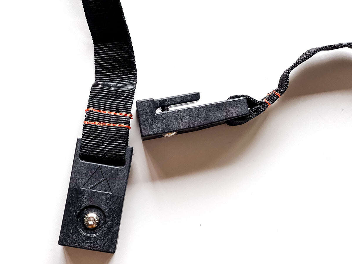 Backslope Tools bucket handle with black nylon strap, orange stitching and metal clasp on Tampa Home & Garden Store