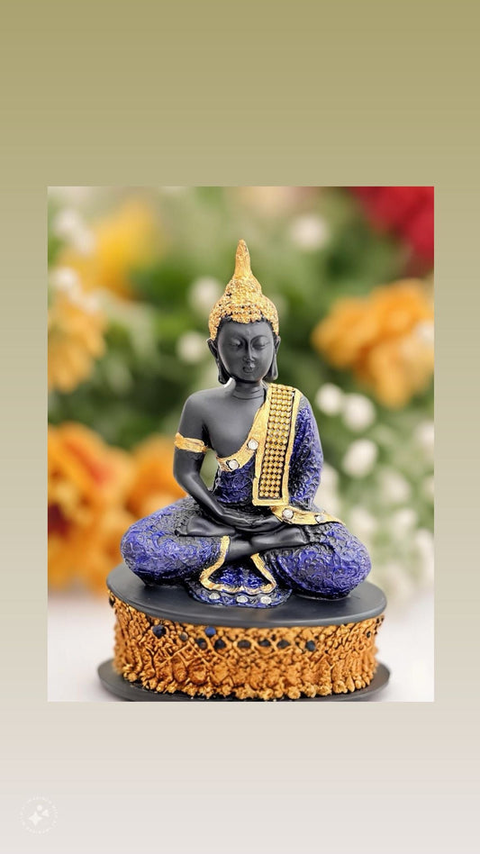 Vibhsa polyresin Buddha idol statue; black figure in blue robe with gold trim, seated lotus pose on Tampa Home & Garden Store