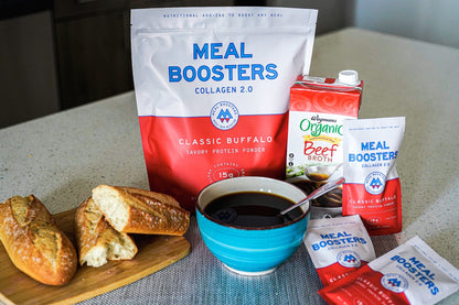 Meal Boosters Classic Buffalo collagen 2.0 protein powder bag with white/red bag beside broth on Tampa Home & Garden Store