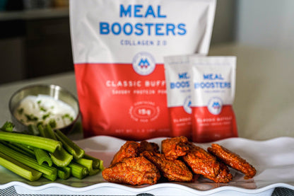 Meal Boosters Classic Buffalo collagen+ protein powder with celery sticks and buffalo bites on Tampa Home & Garden Store
