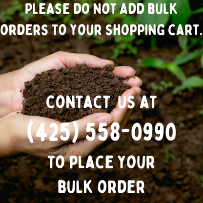 KiS Organics Biochar Soil Mix held in cupped hands above dark brown soil with green seedlings on Tampa Home & Garden Store