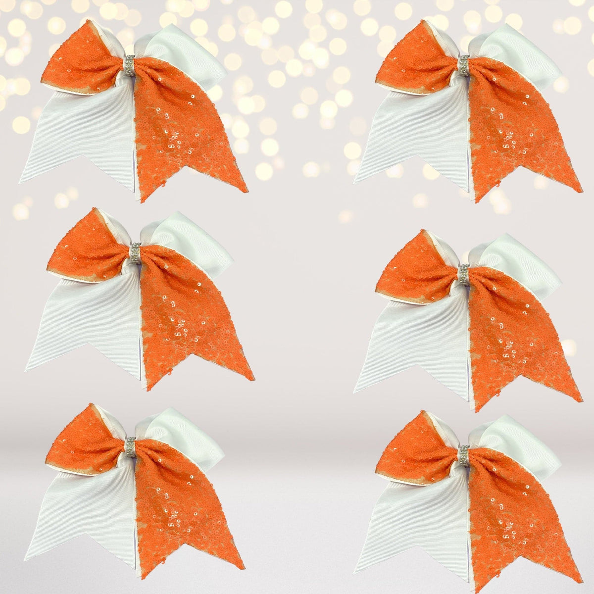 Sequin Cheer Bow 6-Pack hair bows on alligator clips, orange sequins with blue tails on Tampa Home & Garden Store
