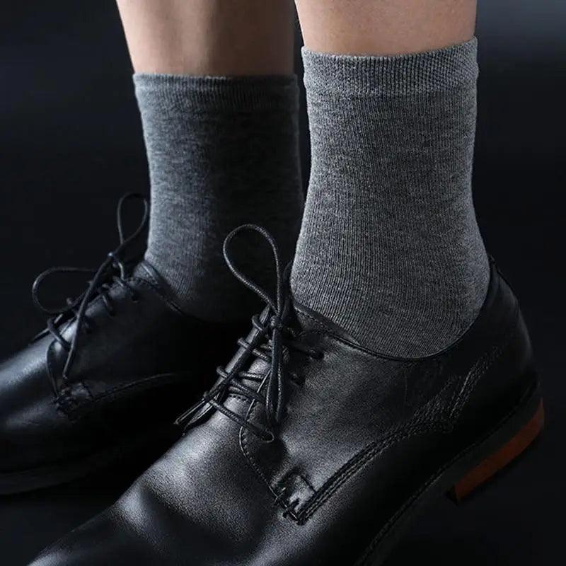 Stevvex men's grey cotton crew socks pair worn with black dress shoes on Tampa Home & Garden Store