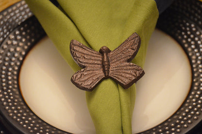 Vibhsa handcrafted antique butterfly napkin ring aluminum with napkin on beaded plate on Tampa Home & Garden Store