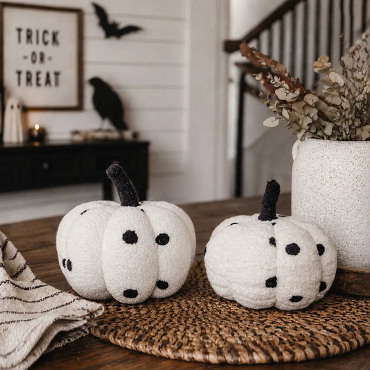 Blair Pumpkin II throw pillows, white plush pumpkins with black stems and spots, two on a mat on Tampa Home & Garden Store