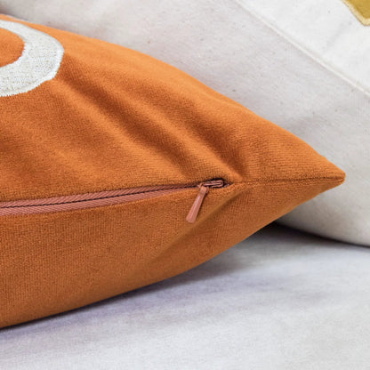 Dora Pillow Cover With Matching Back orange fabric accent pillow with white circular applique and pink zipper on Tampa Home & Garden Store