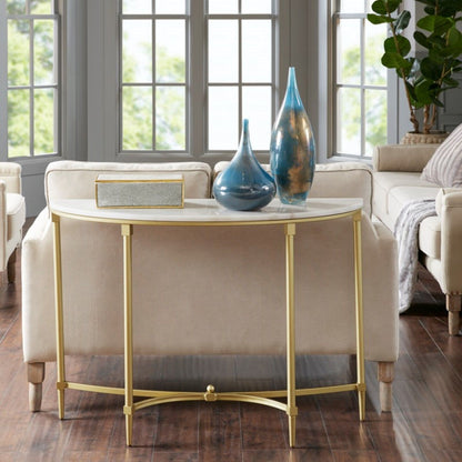 White marble console table with gold metal legs Bordeaux by HouseOfZazla in a bright living room on Tampa Home & Garden Store