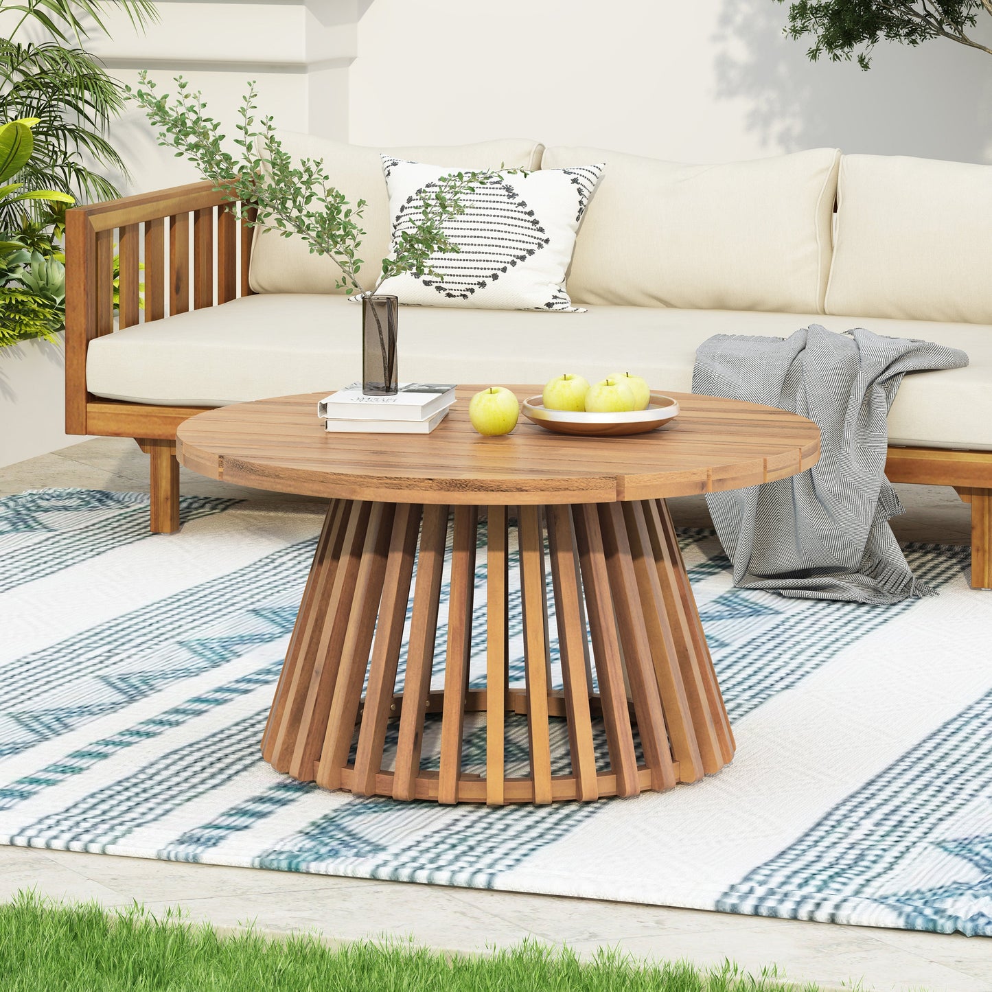 Acacia wood patio coffee table with round slatted pedestal base in natural finish on Tampa Home & Garden Store