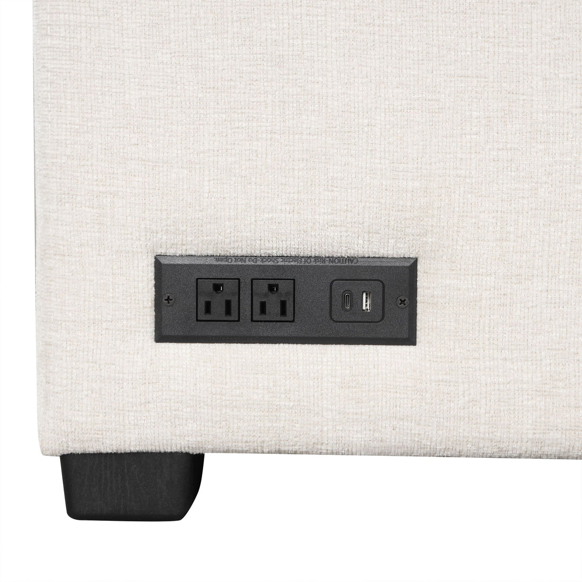 Beige sleeper ottoman with black power panel and two USB ports plus two outlets on Tampa Home & Garden Store