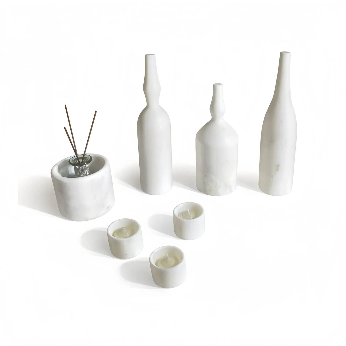 7-piece natural marble living room accessories set featuring white marble vases and candles on Tampa Home & Garden Store