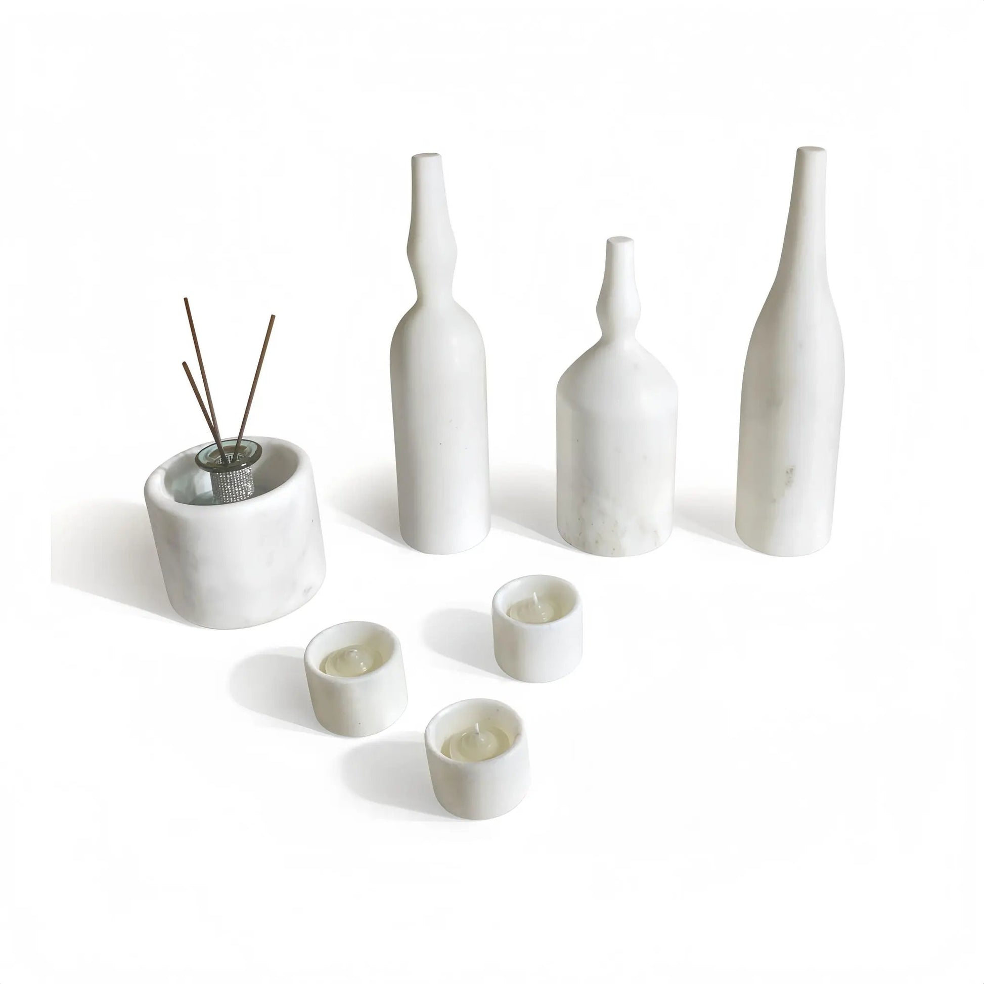 7-piece natural marble living room accessories set featuring white marble vases and candles on Tampa Home & Garden Store