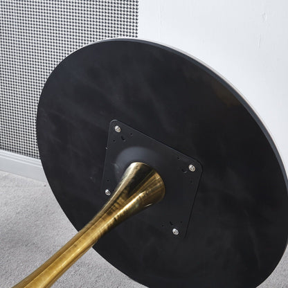 Gold Tulip mid-century dining table with black round top and brass pedestal base on Tampa Home & Garden Store