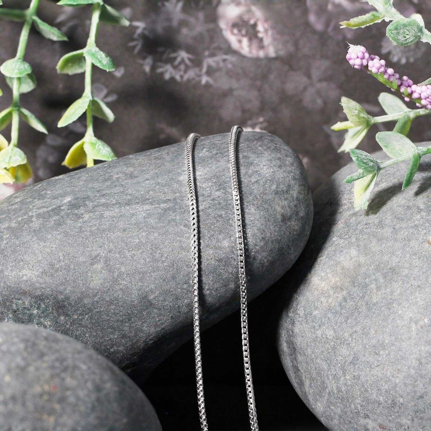 Franco chain necklace 14k white gold, 1.2mm, pair on rock with greenery Bids.com on Tampa Home & Garden Store