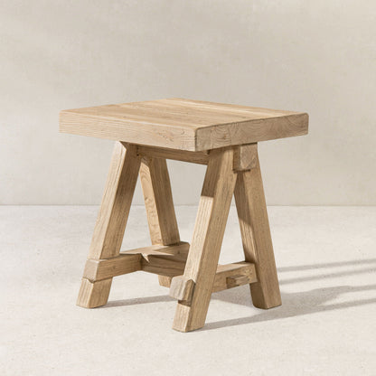 Trestle coffee table with solid reclaimed elm construction in light brown finish on Tampa Home & Garden Store