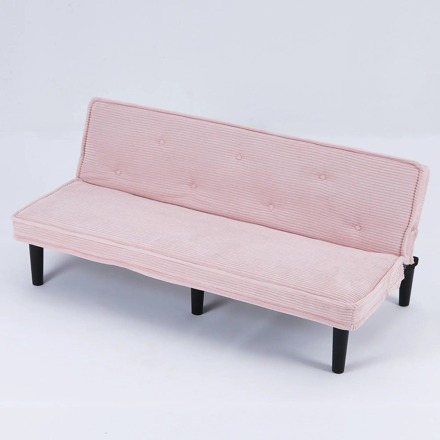 Versatile pink tufted futon sofa with solid wood frame and black legs on Tampa Home & Garden Store