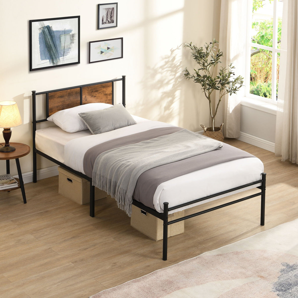 Pair of twin metal bedframes with black steel and wood headboards on Tampa Home & Garden Store