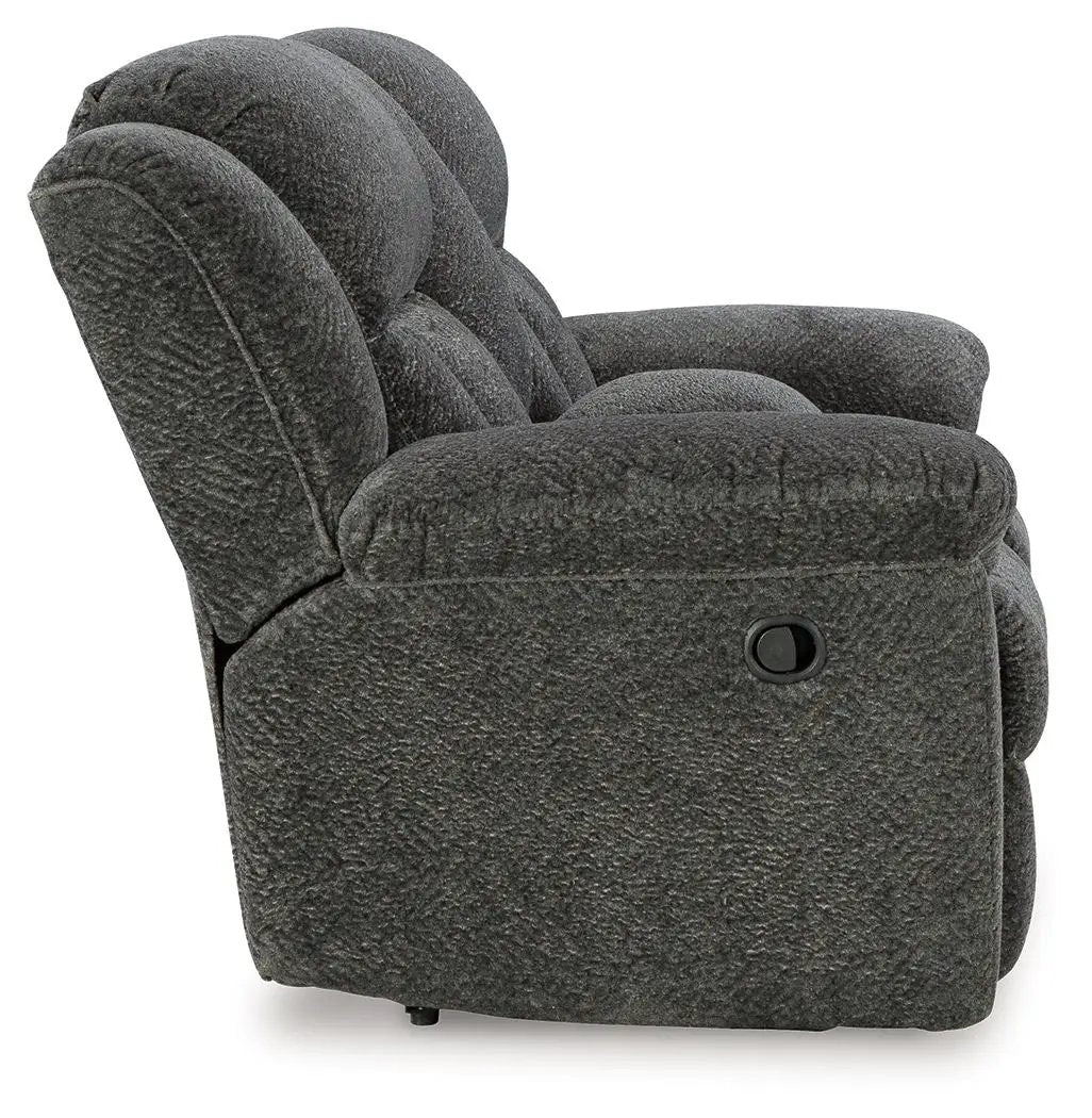 Frohn Dbl Reclining Loveseat With Console dark gray textured fabric recliner lever on side on Tampa Home & Garden Store