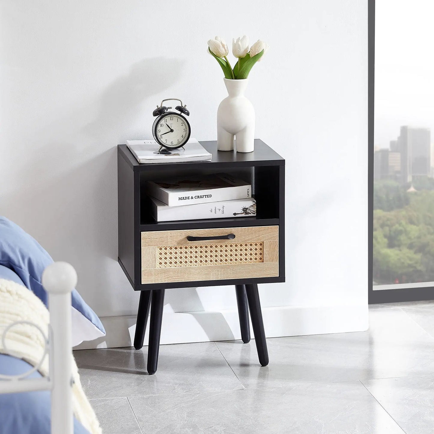 15.75in rattan end table with drawer and wood legs, black modern nightstand with clock and vase on Tampa Home & Garden Store