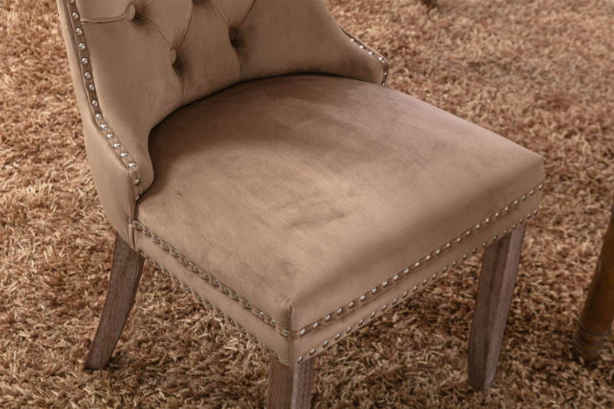 Tufted velvet dining chair set in taupe with nailhead trim and wooden legs on Tampa Home & Garden Store