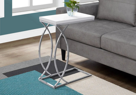 Accent Table C-Shaped with white top and chrome curved X-frame legs beside a gray sofa on Tampa Home & Garden Store