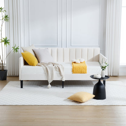 Elena Boucle Upholstered Daybed with ribbed tufted backrest in cream black legs mustard pillows on Tampa Home & Garden Store