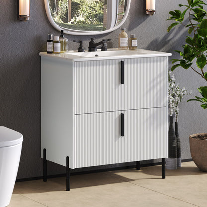 Bathroom vanity by HouseOfZazla with ceramic sink, white fluted cabinet and black hardware on Tampa Home & Garden Store