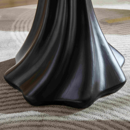 Sculptural round dining table base in black with petal shape and root texture on Tampa Home & Garden Store