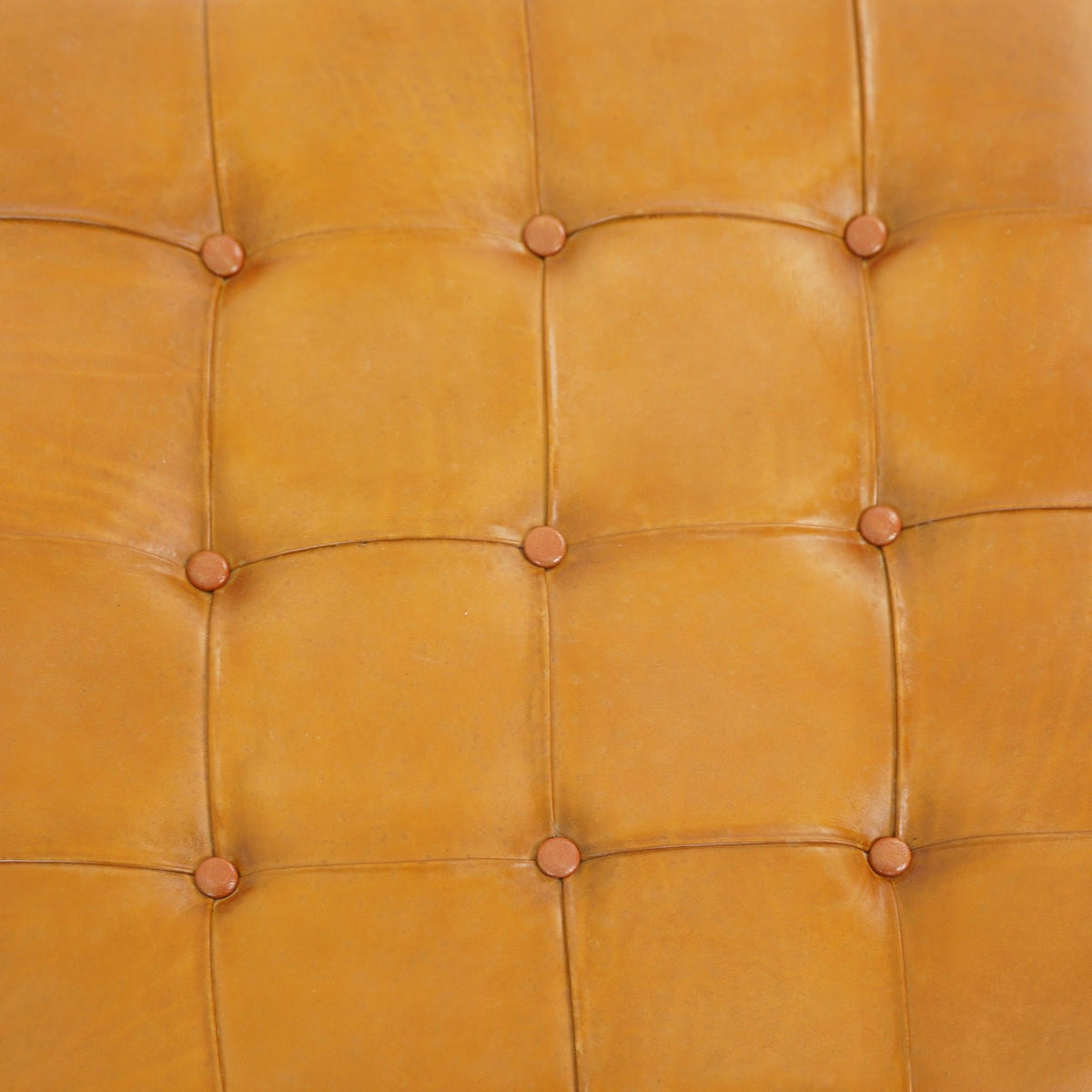 Tufted square leather ottoman in light brown with button tufting and high-density foam on Tampa Home & Garden Store