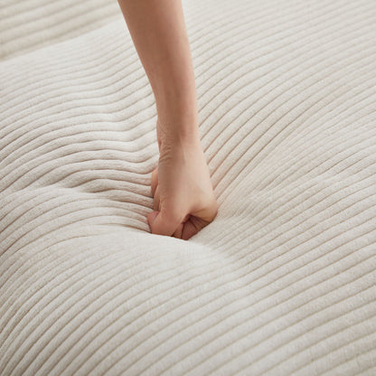Upholstery fabric swatch beige with striped texture being touched by hand on Tampa Home & Garden Store