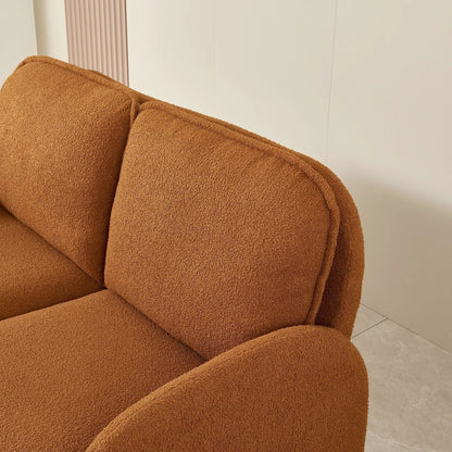 Small sherpa fabric loveseat in warm brown upholstery with plush textured cushions on Tampa Home & Garden Store