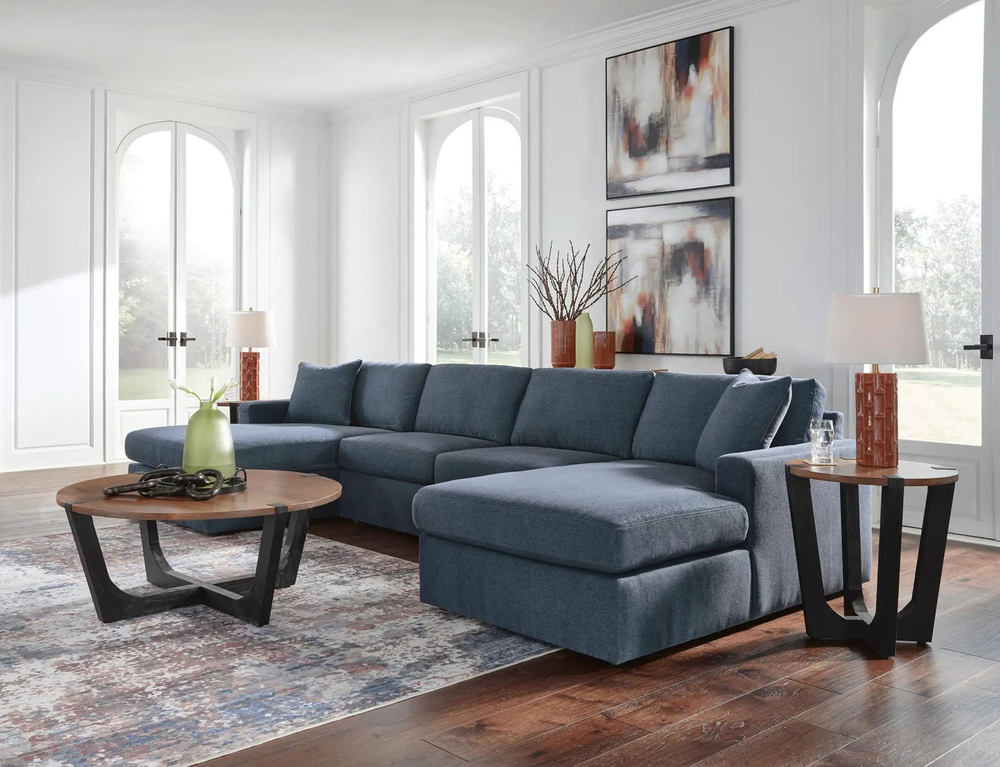 Modmax Sectional Ink blue stationary sofa with chaise in a bright living room on Tampa Home & Garden Store