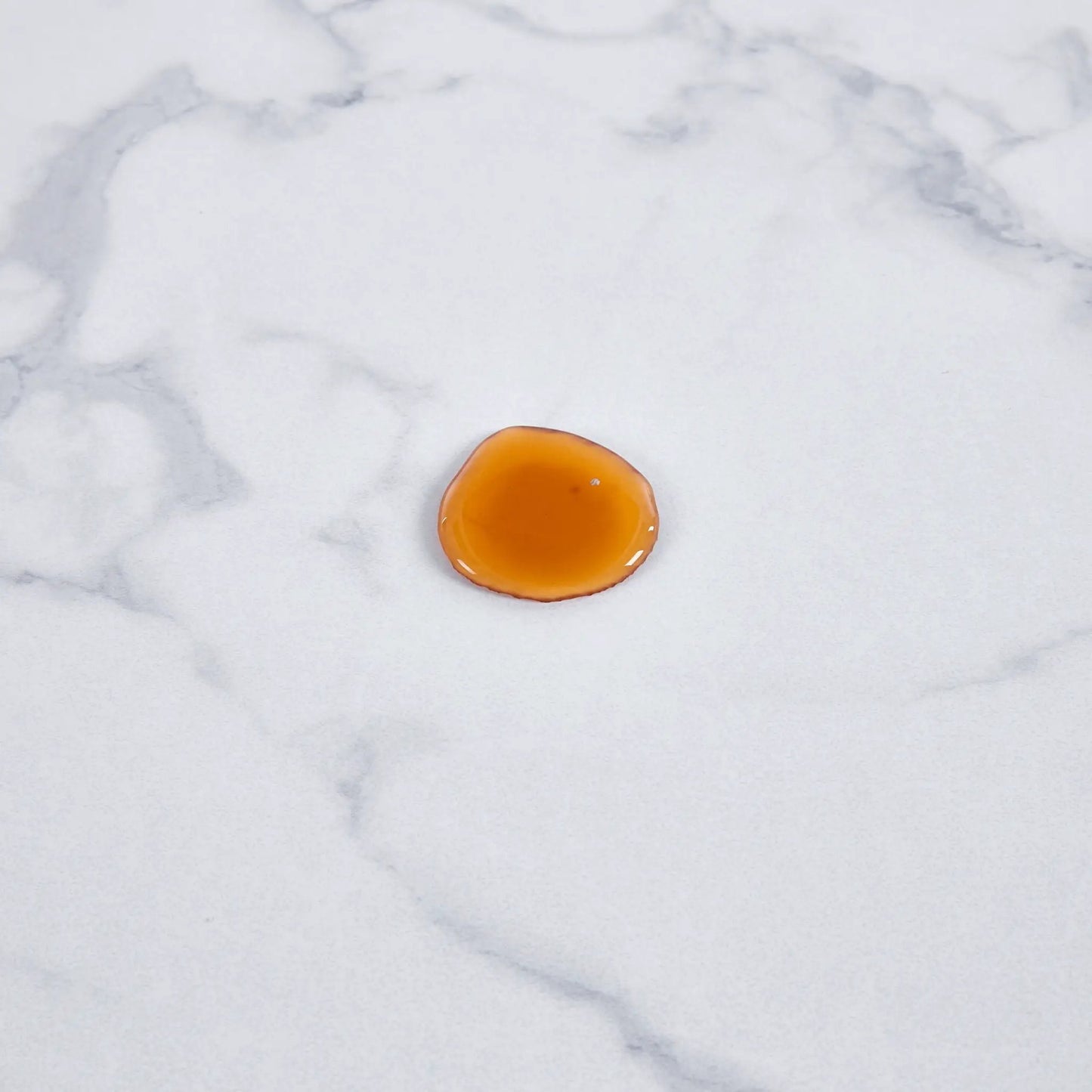 Tulip Special Dining Table orange accent on white marble surface Unique Piece Furniture on Tampa Home & Garden Store