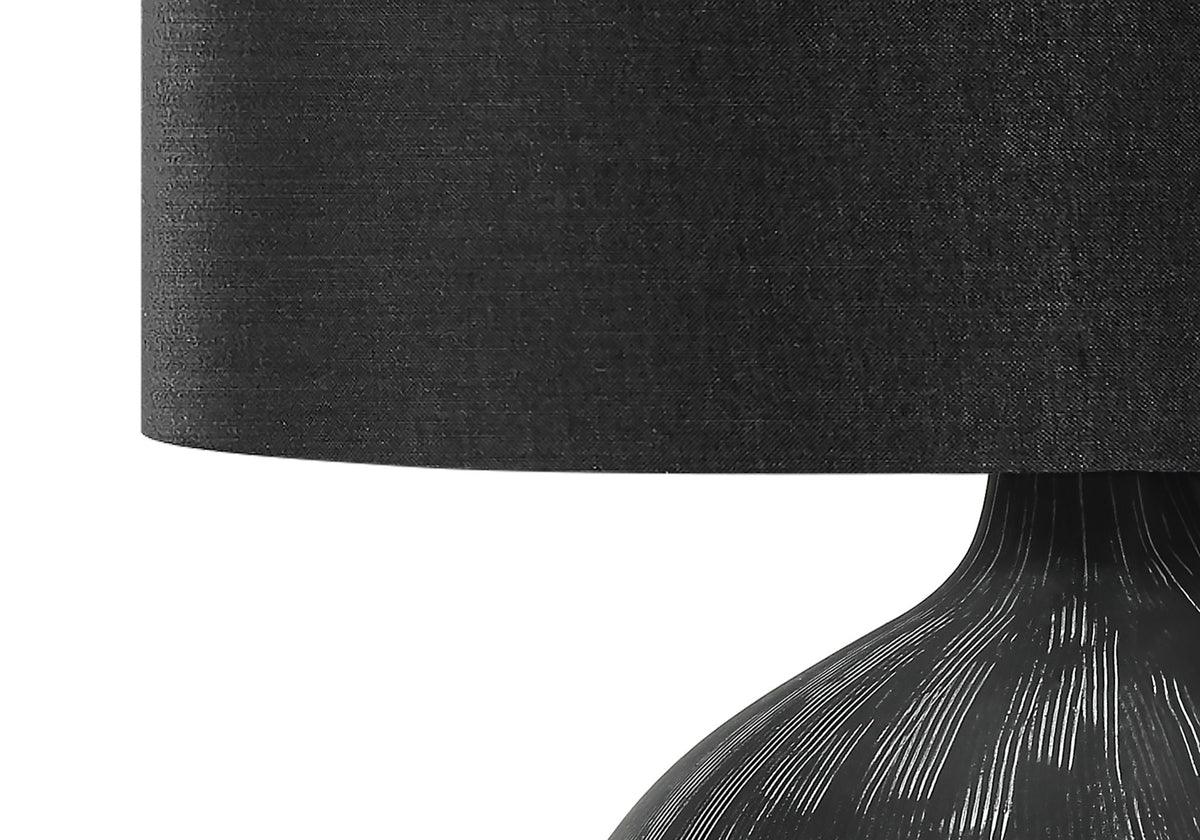 Table lamp ceramic black, contemporary design with a curved ribbed base on Tampa Home & Garden Store