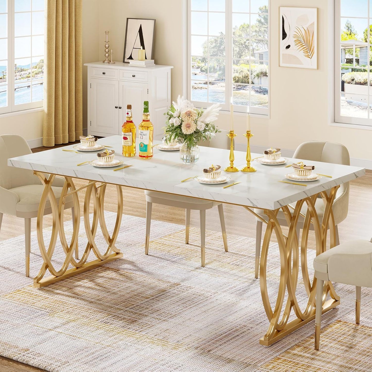 Large rectangular dining table with white marble top and gold geometric legs on Tampa Home & Garden Store