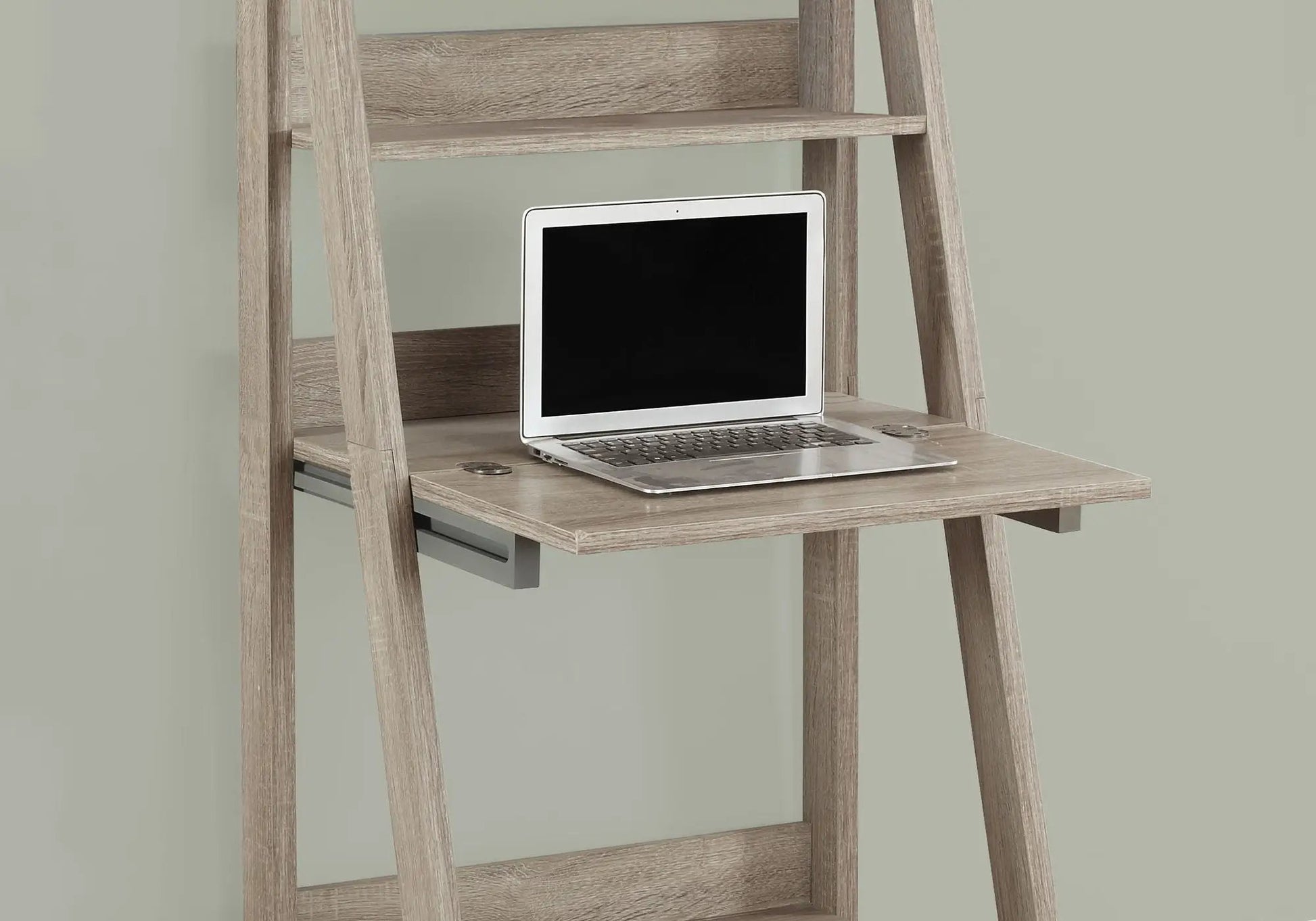 Leaning wooden computer desk with open storage shelves and a laptop on the desk on Tampa Home & Garden Store
