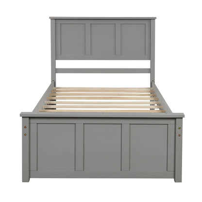 Gray twin platform bed frame with panel headboard and wood slat base for trundle setup on Tampa Home & Garden Store