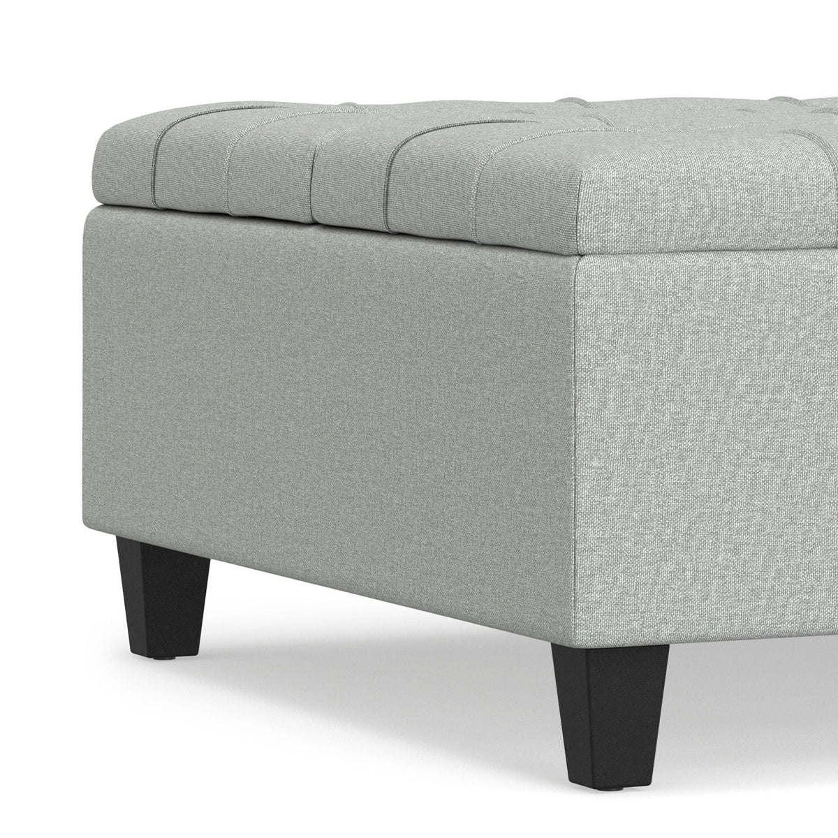 Stone gray fabric storage ottoman with lift-top lid and hidden compartment, black tapered legs on Tampa Home & Garden Store