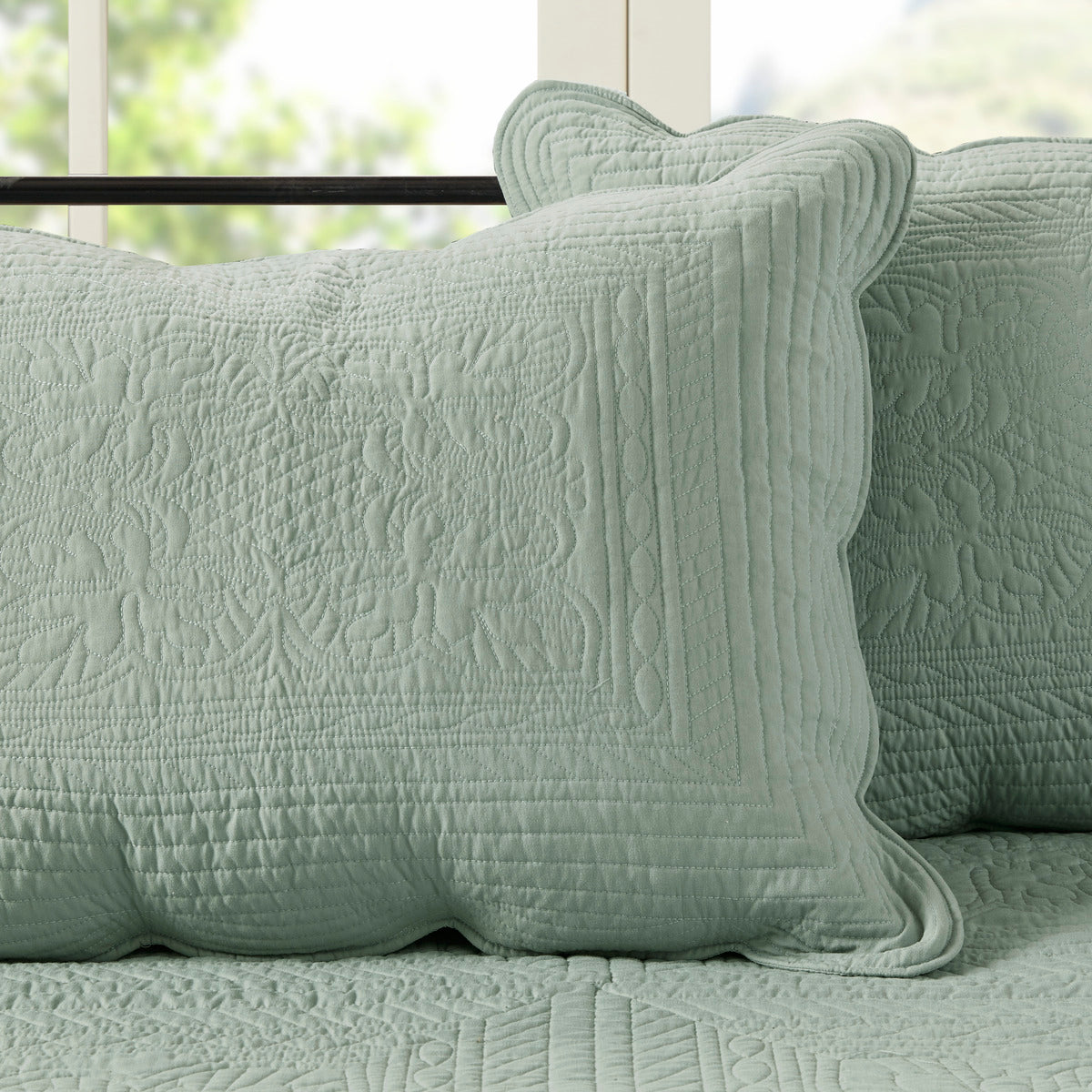 Six-piece reversible seafoam daybed cover set with quilted scalloped-edge shams on Tampa Home & Garden Store