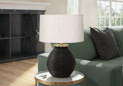 Table lamp with black concrete base and cream shade by Unique Piece Furniture on Tampa Home & Garden Store