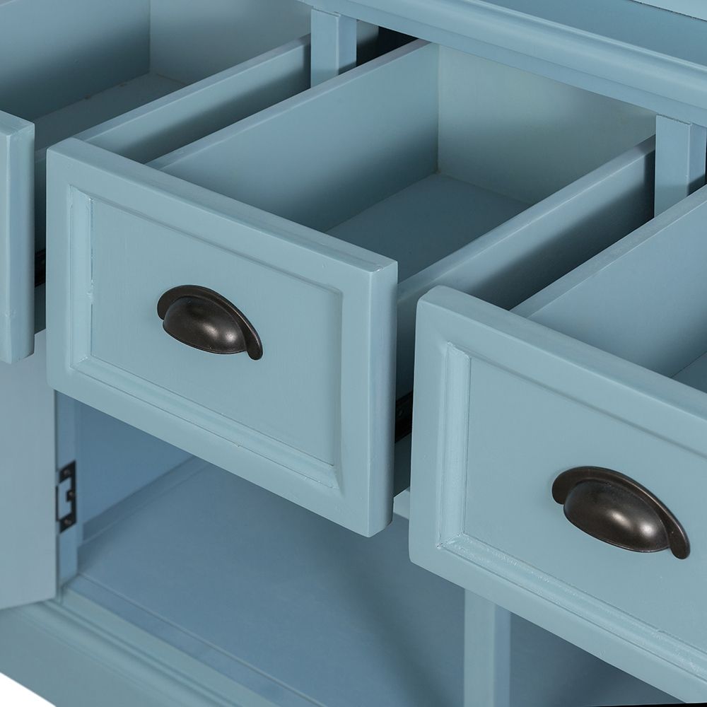 Blue solid acacia wood accent cabinet with two open drawers and dark metal cup pulls on Tampa Home & Garden Store