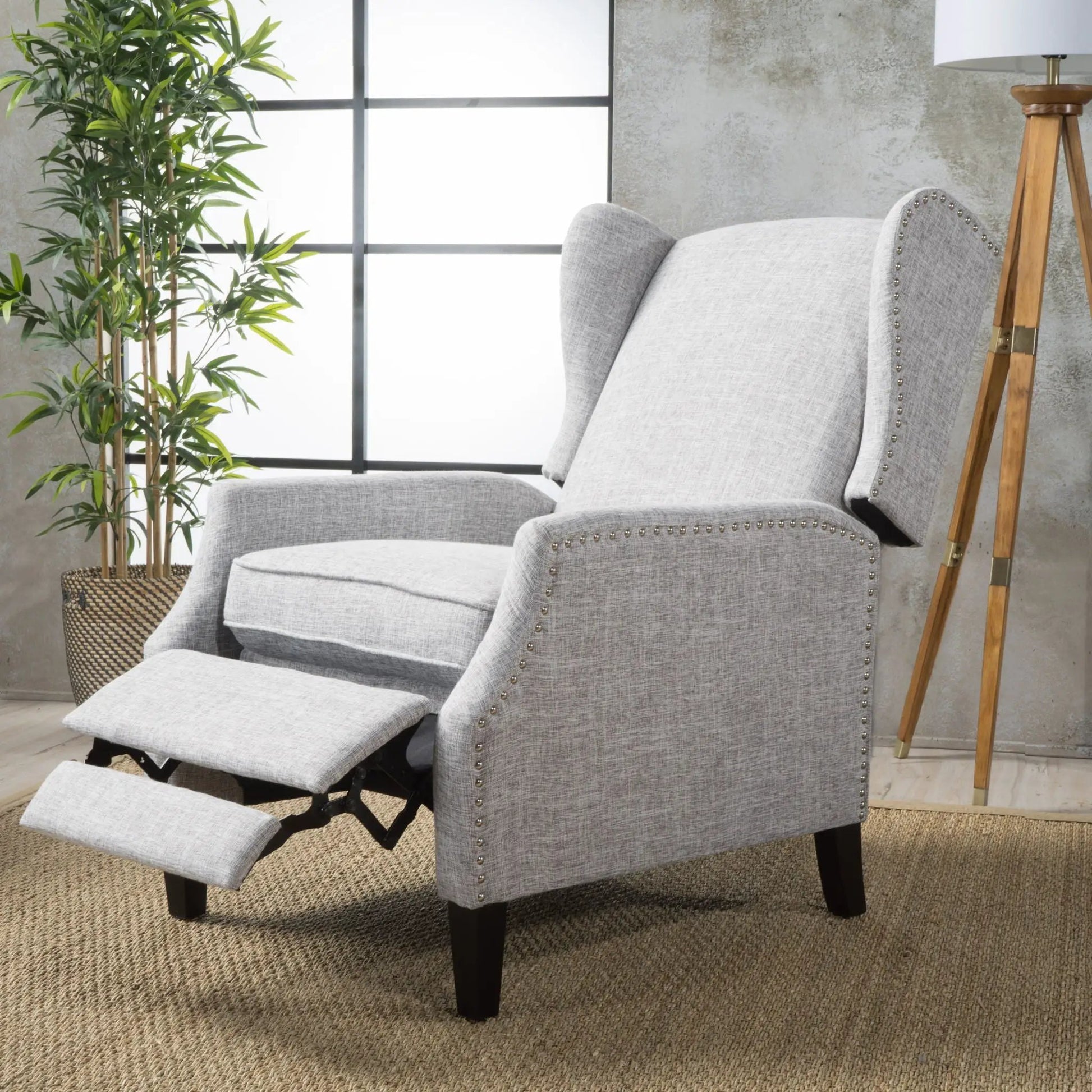 Westeros Wing Back Recliner by Unique Piece Furniture in gray fabric with nailhead trim on Tampa Home & Garden Store