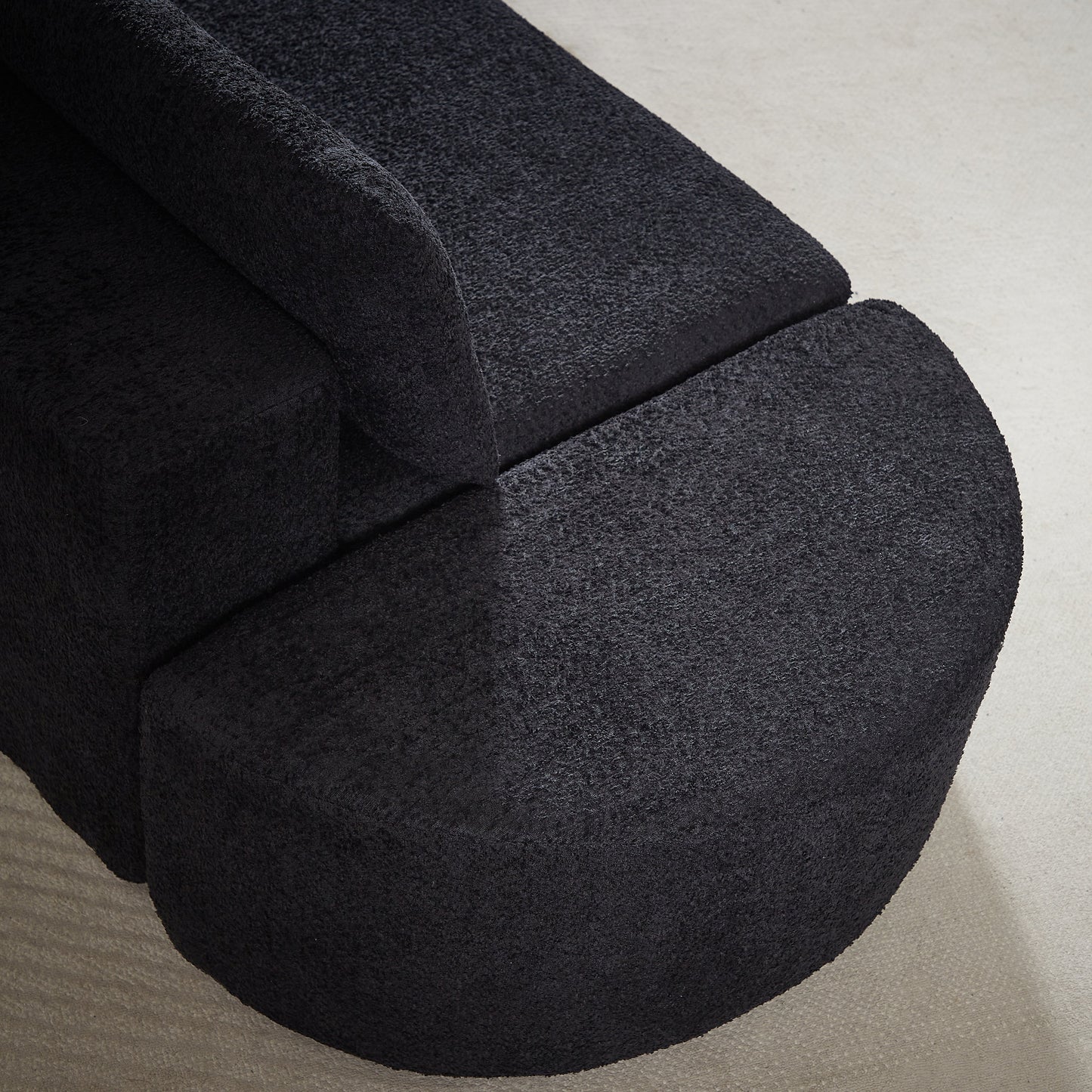 the V-Shaped and Modular Sofa in Chenille Fabric