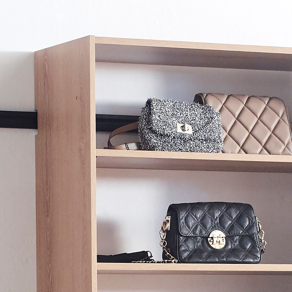Wall mounted wood wardrobe system with modular design in light brown shelves two handbags on Tampa Home & Garden Store