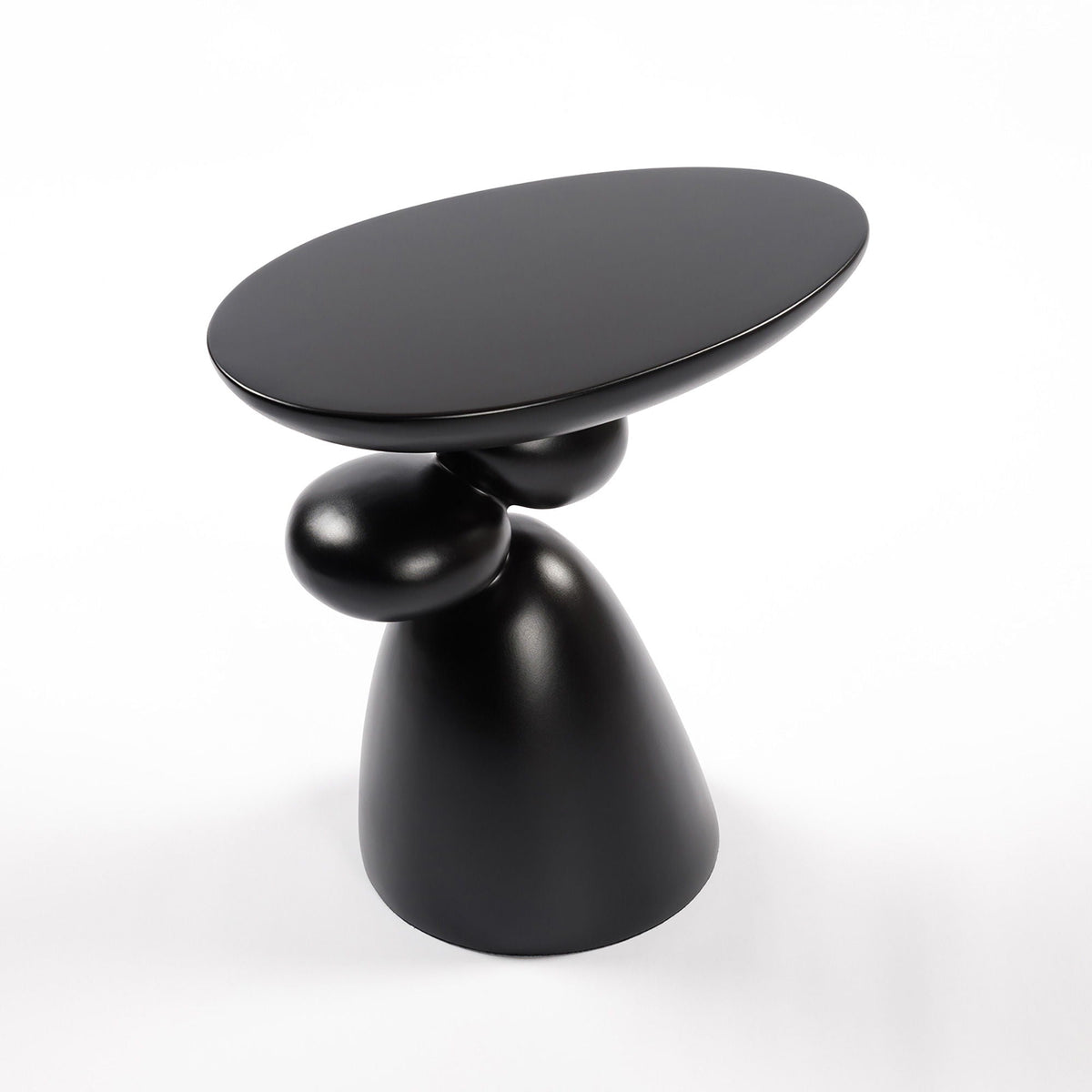 Lucky Stone Shaped End Table in black with sculptural pedestal base by HouseOfZazla on Tampa Home & Garden Store