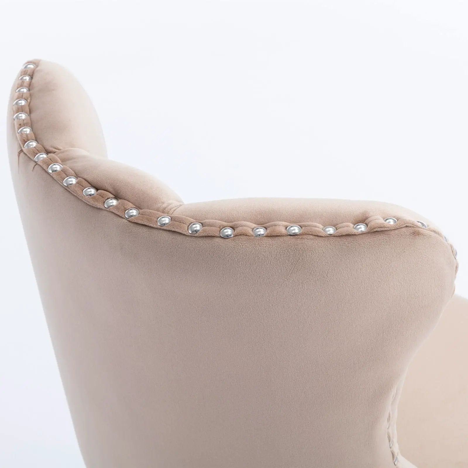 Beige upholstered swivel barstool with silver nailhead trim along curved back edge on Tampa Home & Garden Store