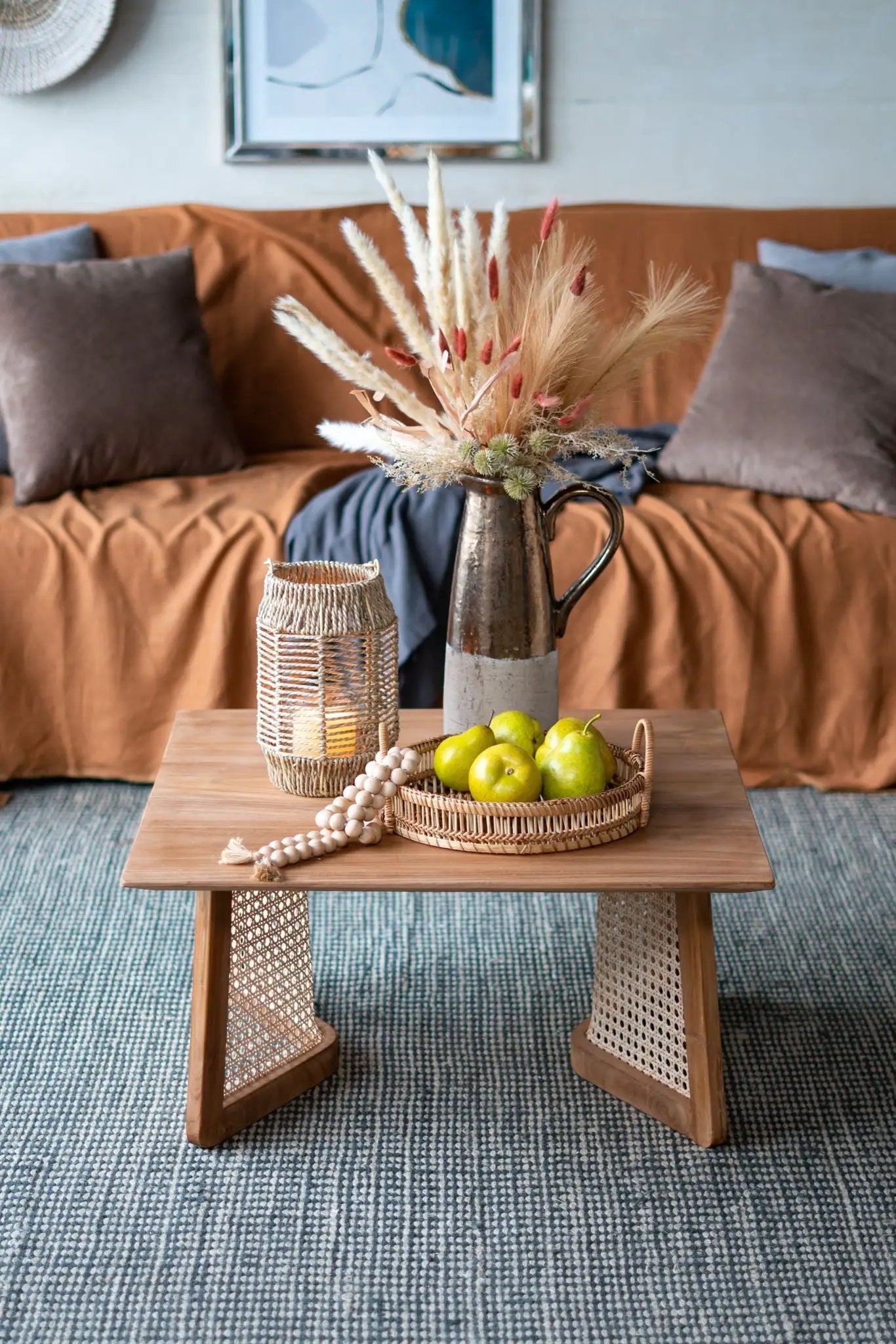 Candia terracotta pitcher with dried grasses bouquet on a wooden coffee table on Tampa Home & Garden Store