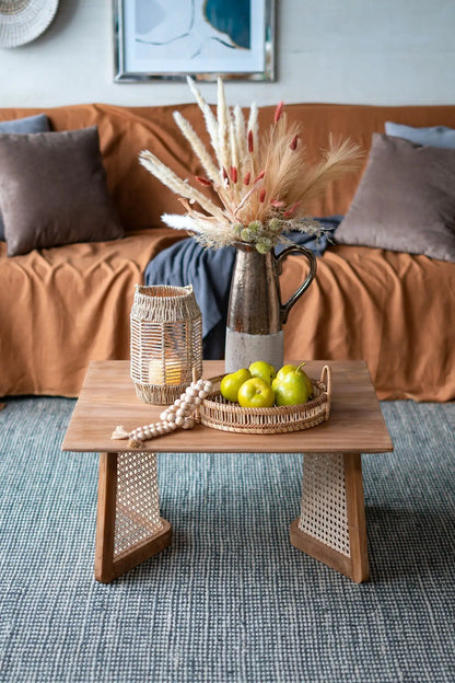 Candia terracotta pitcher with dried grasses bouquet on a wooden coffee table on Tampa Home & Garden Store