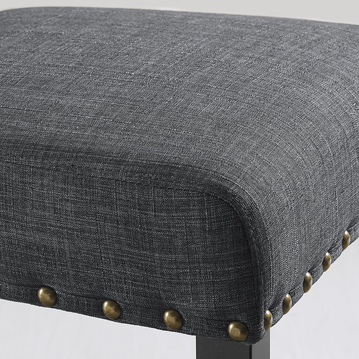 Biony espresso wood dining chair seat in gray fabric with nailhead trim and brass studs on Tampa Home & Garden Store