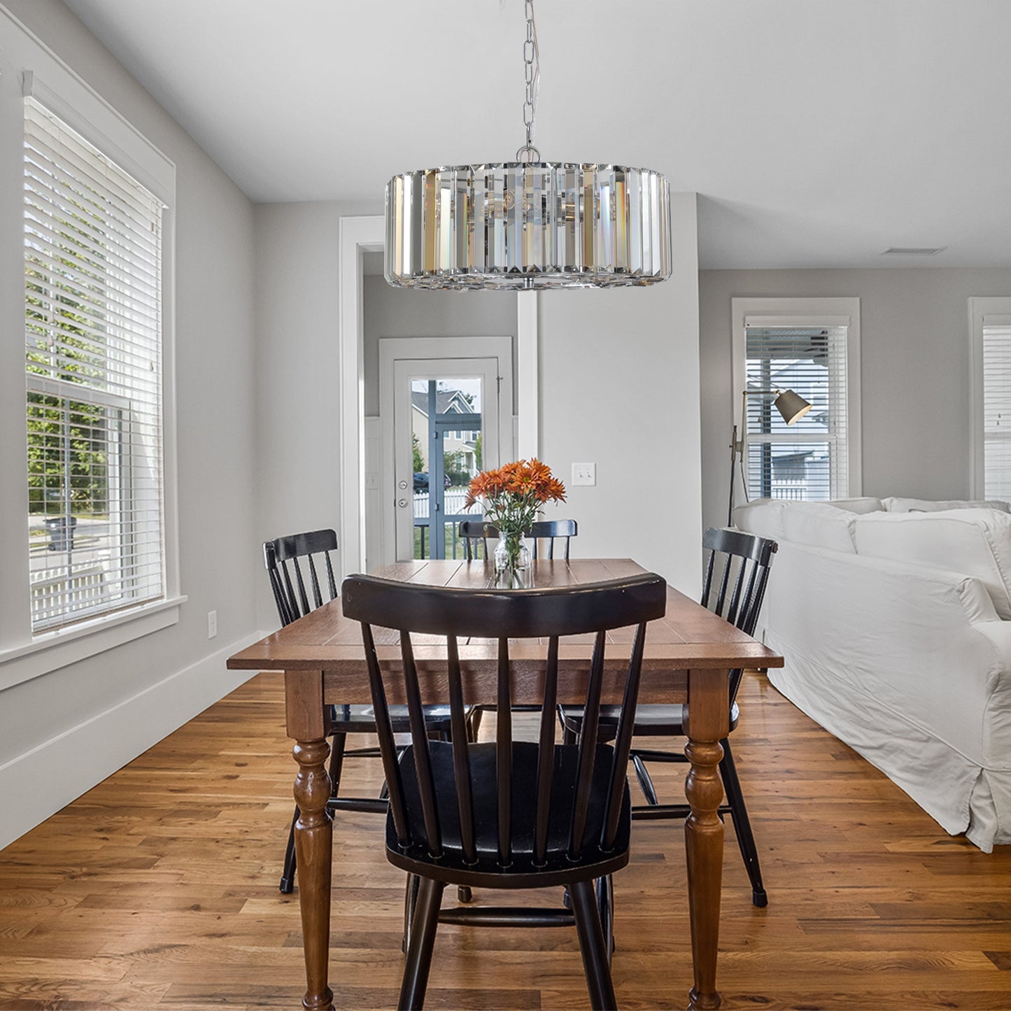 17' Chrome Crystal Pendant Chandelier with crystal prisms and chrome frame over a wooden table on Tampa Home & Garden Store
